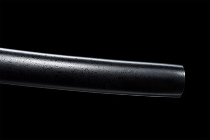 Kissaki du wakizashi Maizuru en acier Damas